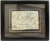 A framed and glazed historical postmark