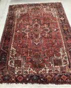 A 20th Century Persian rug, the central