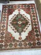 A Turkish carpet, the central panel set