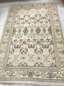 An Oka rug, the central panel set with a