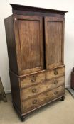 A 19th Century mahogany linen press, the