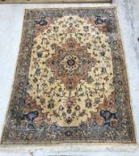An Indian rug, the central medallion on