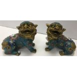 A pair of Chinese gilded and cloisonné decorated temple lion figures, snarling, seated,