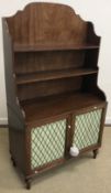 A 19th Century mahogany side cabinet, the three quarter galleried top with two shelves,