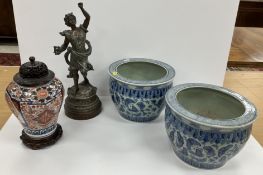 A pair of blue and white jardinieres of