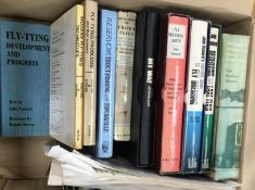 A box of various fishing books to includ