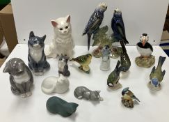 A collection of Cat and Bird figurines c