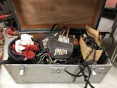 A metal covered trunk and contents of va