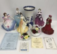 A collection of figurines comprising Coa