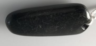 An early South African rhino horn amulet