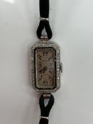 A white metal and diamond set cocktail w