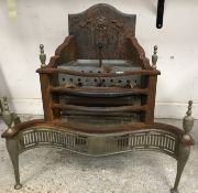 A 20th Century cast iron and brass fire