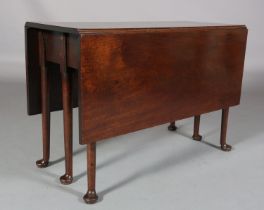 A MID 18TH CENTURY MAHOGANY PEMBROKE SUPPER TABLE, having rectangular drop leaves, on six rounded