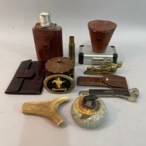 A crocodile skin wallet, a leather covered spirit flask and set of cups, a penknife with compass