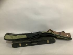 Two gun slips and a modern case