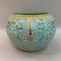 A Chinese jardinière, the turquoise ground enamelled in famille rose, yellow, green and blue with