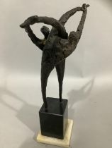 A 20/21st Century bronze group of two figures entwined, raised on a black marble plinth with