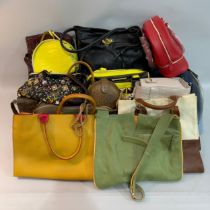 An Elizabeth Arden red handbag, a Radley yellow leather round handbag with shoulder strap, a mustard
