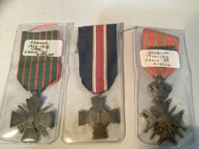 A French 1914/18 Croix de Guerre with ribbon together with a Belgian 1914/18 Croix de Guerre with