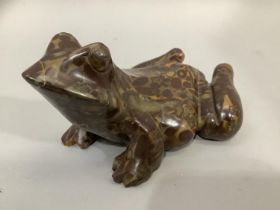 A carved jasper figure of a frog 14cm long x 8cm high (damage to one toe)