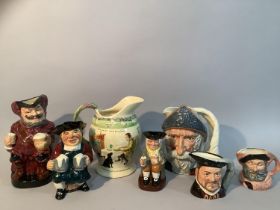 A Royal Doulton Don Quixote character jug together with four others and a Staffordshire example as