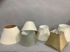 A quantity of lamp shades, various shapes and sizes