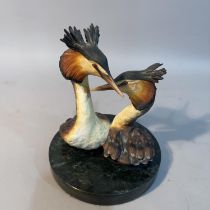 A china group 'Pironette' of Great Crested Grebes, (Podiceps Cristatus), modelled by Judy Boyt no.