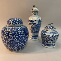 A Chinese porcelain blue and white vase of baluster form painted with a pagoda in a landscape with