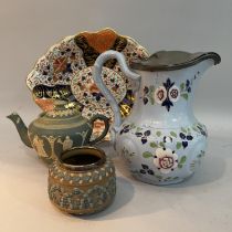 A 19th century Ridgeway & Co blue pottery jug, pewter lidded, and enamelled with trailing flowers in