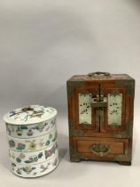 A 19th century Chinese famille rose porcelain cylindrical stacking box and cover painted vases and