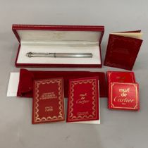 A Cartier Pasha fountain pen, Must De No: 78454 oval beaded silver plate barrel with original box,