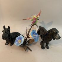 A Boehm flower and hummingbird figure group with Boehm back stamp, a Royal Doulton Scottie dog