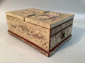 A Chinese burgundy lacquered and mother-of-pearl casket, the lift up lid fitted with a mirror