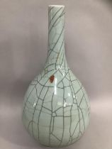 A large Chinese celadon crackle glaze vase, remnants of wax seal attached, 57cm high