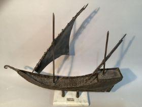F.J. Akers, sculpture of a cargo boat, in spelter on marble base, 46cm x 51cm