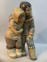A large Lladro Gres group 'Inuit boy and girl' no. 2038 designed by Juan Huerta, with Lladro mark to