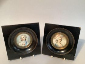 A pair of early 20th century portrait miniatures of Marie-Antoinette and Louis XVI, circular,