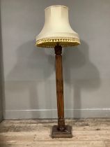 A carved mahogany standard lamp, 110cm high