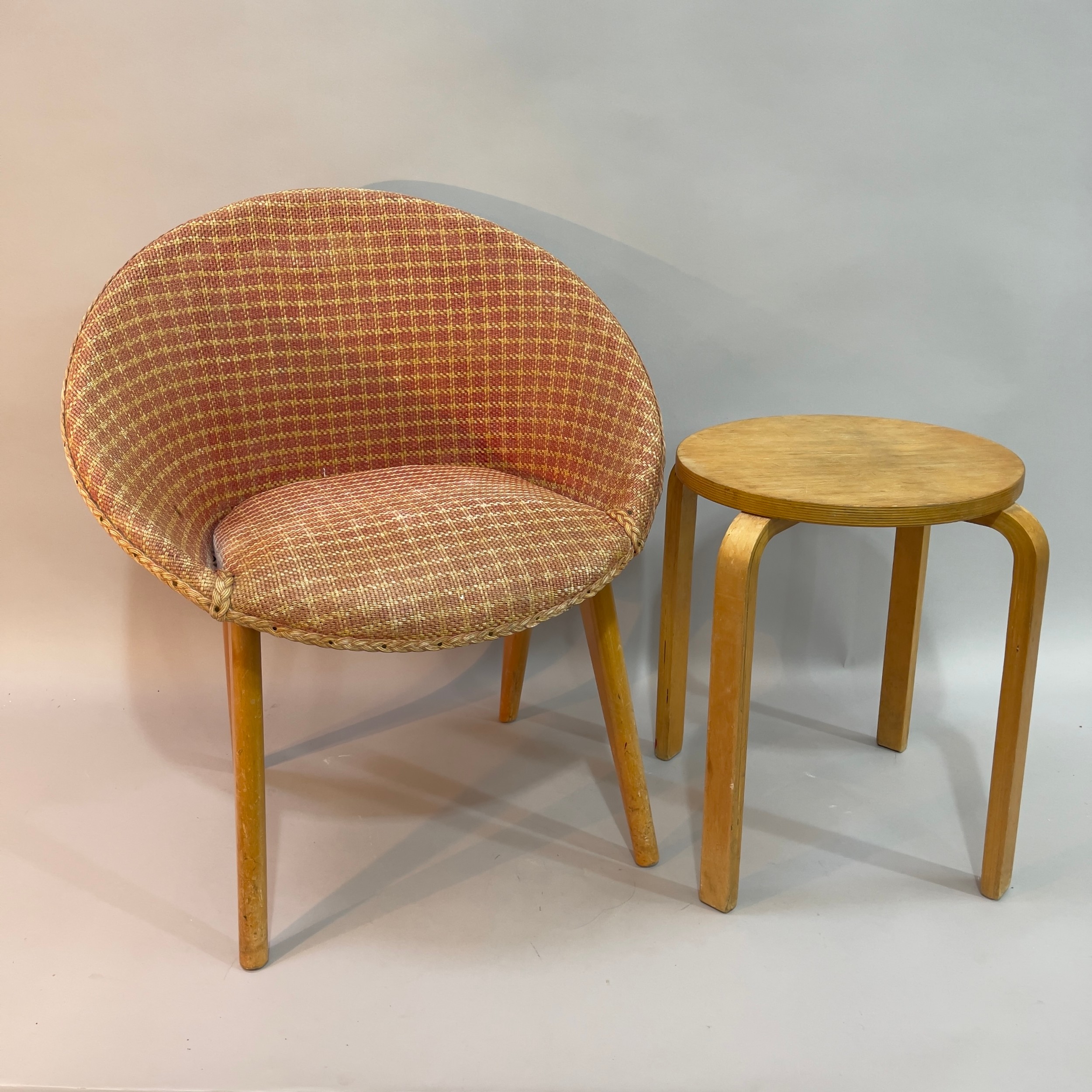 A bentwood stacking stool in the style of Alvar Aalto together with a late 1950s basket weave