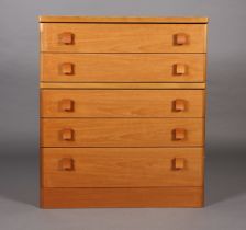 A Stag teak chest c1980s, of five graduated drawers with curved handles on a plinth base, 82cm