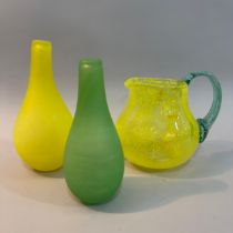 Gunnel Sahlin for Kosta Boda, Swedish (b.1954), a green glass bottle shaped vase and another in