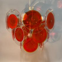 Gino Vistosi (1925-1980) for Venini c.1960s, Murano orange glass disc four light chandelier, the