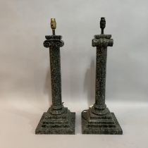 A pair of granite ionic column table lamps on stepped square base, 63cm high
