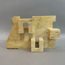 A Spanish pale yellow and grey marble sculpture, of a frieze, stepped and pierced, indistinctly