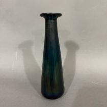 John Ditchfield (b. 19520 An aquamarine and blue iridescent glass vase of tapered form with