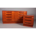 A G-Plan teak chest of two banks of four drawers with curved linear handles on recessed plinth base,