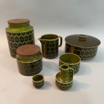 Hornsea pottery 'Heirloom' ware in olive green/black including two storage jars, 20cm and 11.5cm
