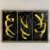 A dark blue and yellow glazed triple tile plaque in wooden frame, 22cm x 32cm