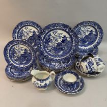 Quantity of Burleigh ware blue and white willow pattern dinner ware with gilt rims, six dinner