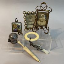 A bone snuff bottle and stanhope in the shape of an umbrella A/F, two miniature gilt photo frames, a